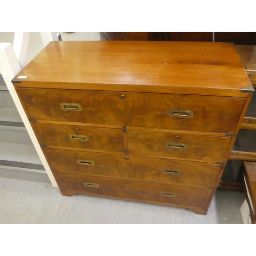 295 - A late 19thC and later mahogany two part military chest with brass corner re-enforcement and recesse... 