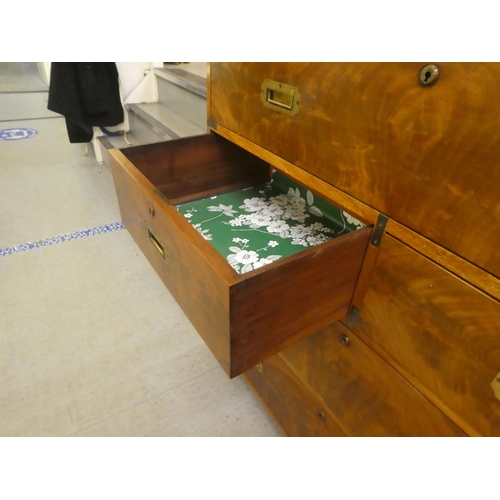 295 - A late 19thC and later mahogany two part military chest with brass corner re-enforcement and recesse... 