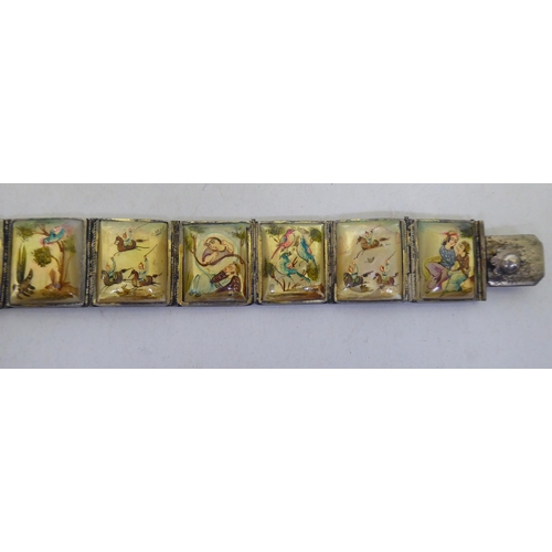 302 - Indian white metal jewellery, each set with painted mother-of-pearl tablets