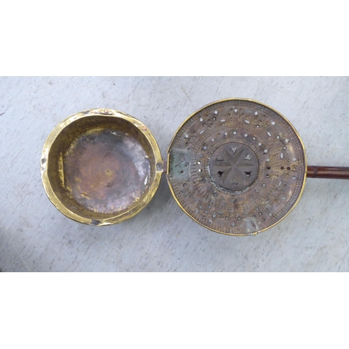 308 - A late 18thC brass bed warming pan, on a turned fruitwood handle  50