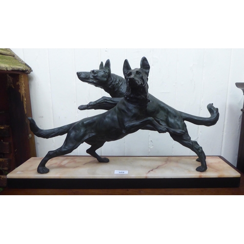 309 - A 1930s Art Deco patinated spelter ornament, two playful dogs, on a marble plinth  14