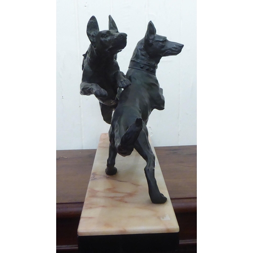 309 - A 1930s Art Deco patinated spelter ornament, two playful dogs, on a marble plinth  14