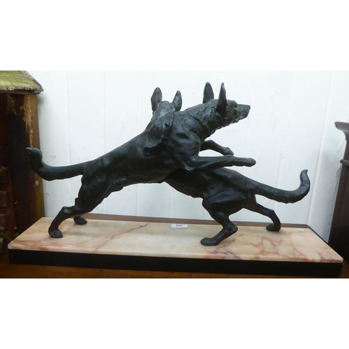 309 - A 1930s Art Deco patinated spelter ornament, two playful dogs, on a marble plinth  14