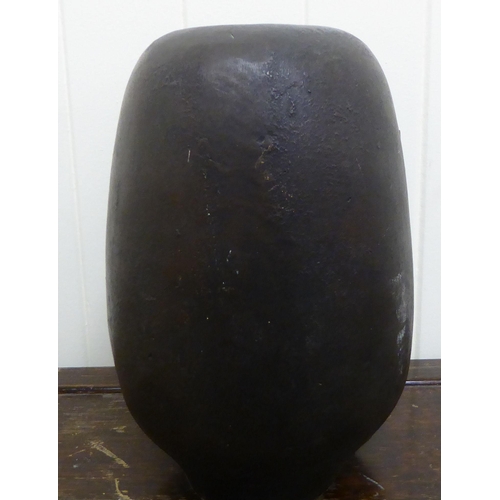 312 - A cast bronze and bulbous base  inscribed EFT 1980  10