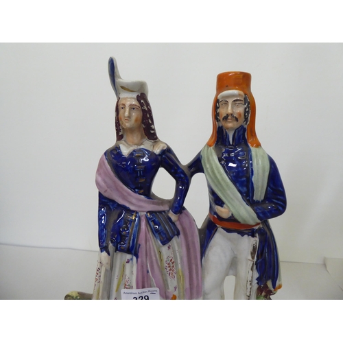 329 - Victorian Staffordshire pottery figures: to include 'Highland Jessie'  14.5