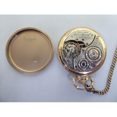 341 - An Illinois gold plated pocket watch, the movement faced by an Arabic dial with a gold plated watch ... 