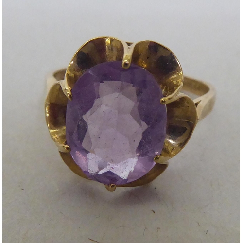 343 - A 9ct gold amethyst solitaire ring