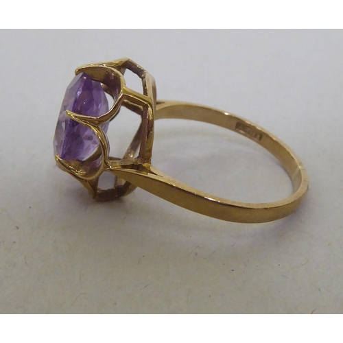 343 - A 9ct gold amethyst solitaire ring