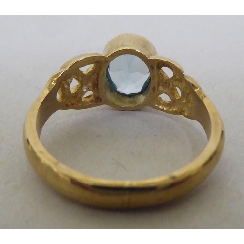 345 - A 9ct gold blue topaz solitaire ring