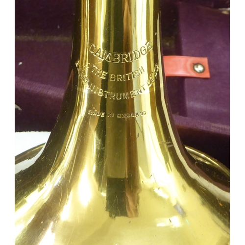 347 - A Cambridge brass finished trumpet  cased