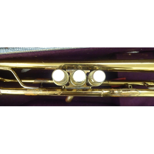 347 - A Cambridge brass finished trumpet  cased