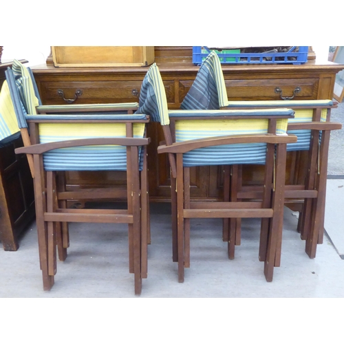 348 - A set of four John Lewis teak framed, folding directors chairs with fabric backs and seats