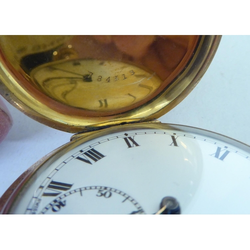 359 - An early 20thC gold plated hunter pocket watch, faced by a Roman dial