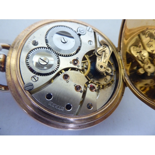 359 - An early 20thC gold plated hunter pocket watch, faced by a Roman dial