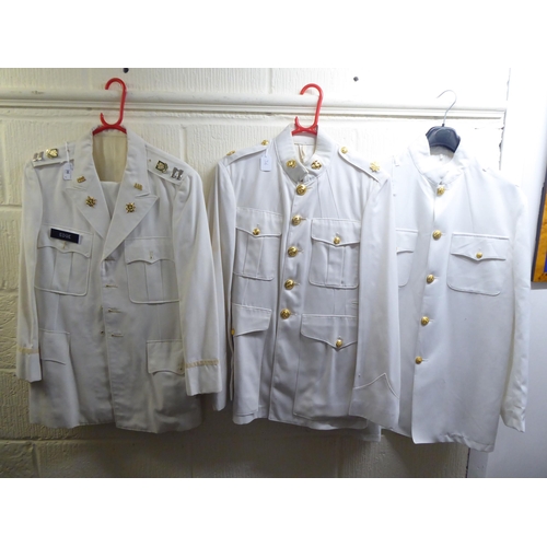 36 - Seven various British and US military mess uniforms: to include tunics and formal shirts(Please Note... 