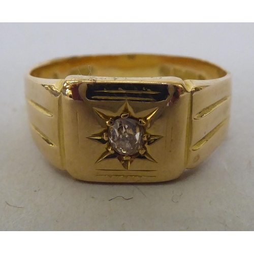 363 - An 18ct gold diamond set signet ring