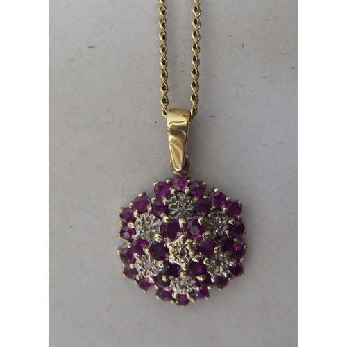 364 - A 9ct gold ruby and diamond pendant necklace