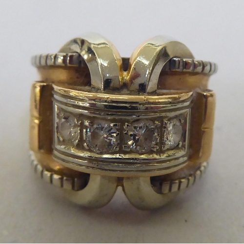 367 - An 18ct gold, diamond set buckle design ring