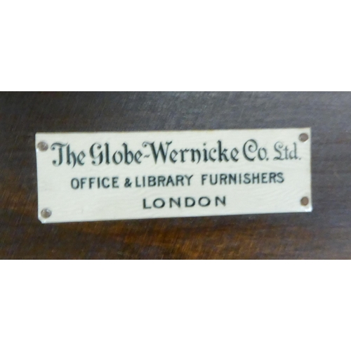 375 - An oak Globe Wernicke four section, glazed front bookcase  49.5