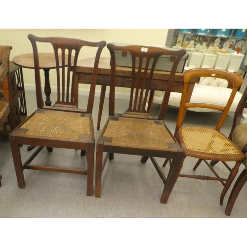 376 - Chairs: to include a late Victorian oak framed bar back dining chair, raised on turned legs