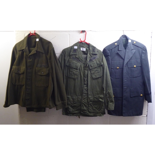 56 - Approx. twenty various, mainly British military uniforms: to include tunics, jackets and coats(Pleas... 