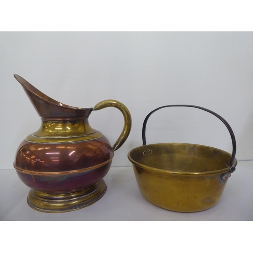 69 - Metalware: to include a late Victorian brass preserve pan with a fixed wrought iron handle  16