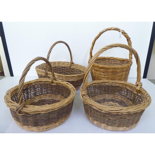 71 - Four woven cane baskets  largest 17