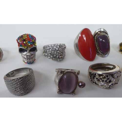 8 - Signet style and other dress rings in white and yellow metal, variously set with coloured stones&nbs... 