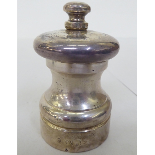 86 - Silver collectables: to include a Peter Piper pepper mill  London marks indistinct