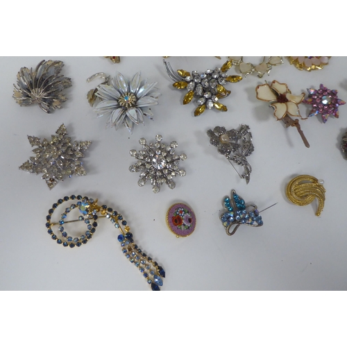 88 - Costume jewellery, mainly brooches, variously set with coloured stones and glass ornament 