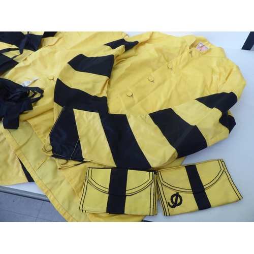 107 - Jockey's silks, pennants and horseshoes