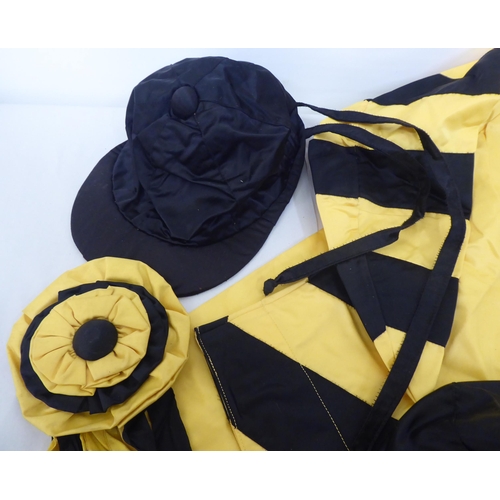 107 - Jockey's silks, pennants and horseshoes