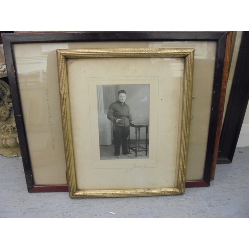 142 - Variously framed late 19thC and early 20thC photographs: to include a group of male athletes with a ... 