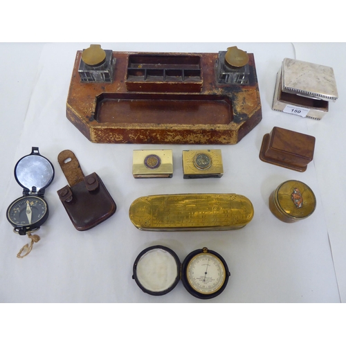 150 - A mixed lot: to include a late 18thC Dutch, oval engraved brass tobacco box; and a late 19thC Stewar... 