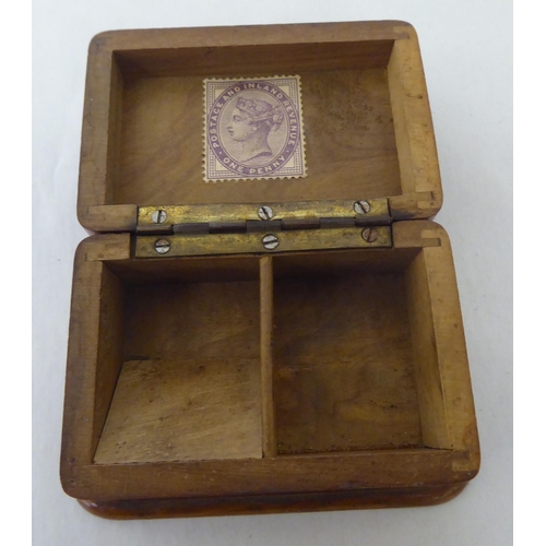 150 - A mixed lot: to include a late 18thC Dutch, oval engraved brass tobacco box; and a late 19thC Stewar... 