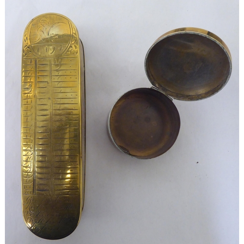 150 - A mixed lot: to include a late 18thC Dutch, oval engraved brass tobacco box; and a late 19thC Stewar... 