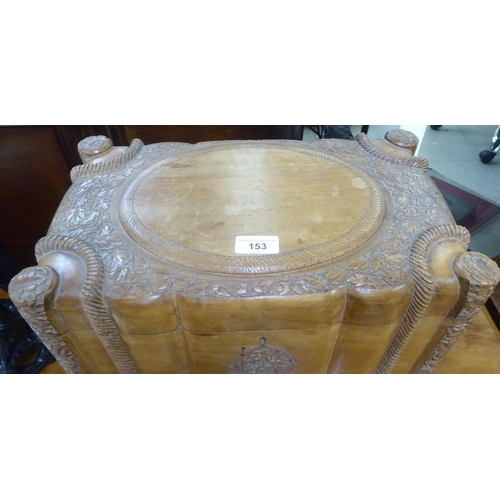 153 - A Kashmiri carved teak sewing box with a tray fitted interior  15