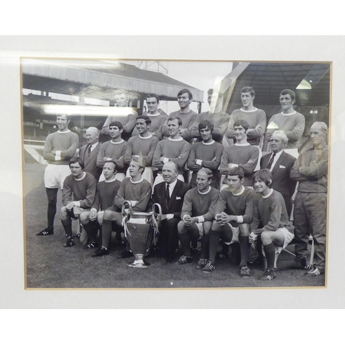 154 - A framed monochrome photograph, featuring the 1968 European Cup Holders, including George Best and J... 