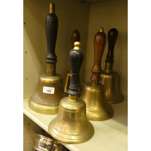 159 - Five brass hand bells with turned wooden handles  largest 14