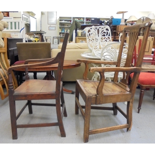 161 - Two 19thC fruitwood framed dining chairs, viz. one with open arms and a hollow seat, the other with ... 