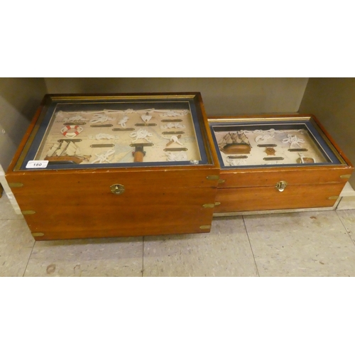 180 - Two brass bound glazed, mahogany boxes, containing nautical knots and model boats  largest 8