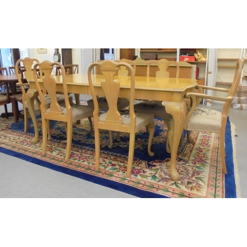 181 - A modern bleached walnut dining table, raised on cabriole legs  30