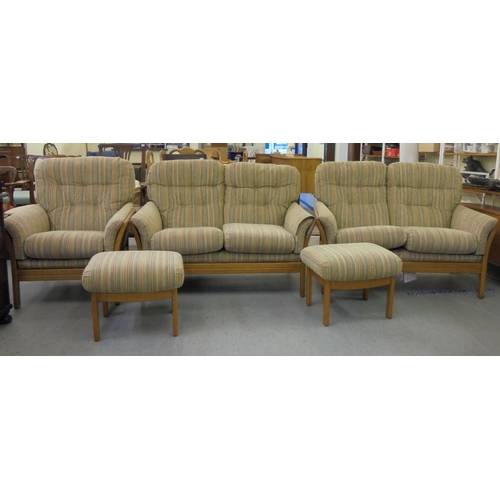 190 - A suite of Cintique beech framed furniture,  comprising two, two person settees, an arm chair and tw... 