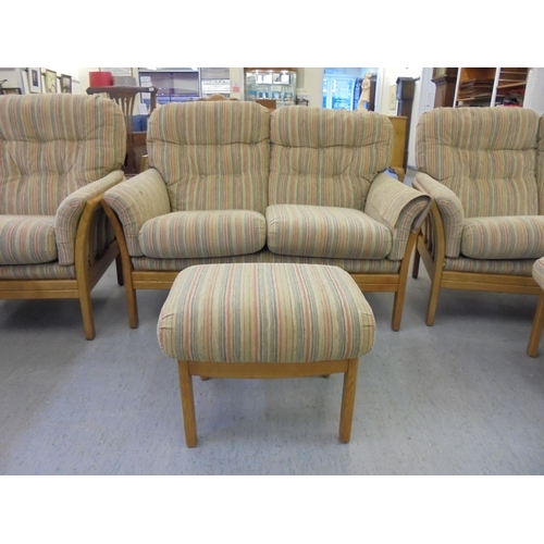 190 - A suite of Cintique beech framed furniture,  comprising two, two person settees, an arm chair and tw... 