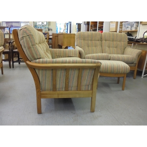 190 - A suite of Cintique beech framed furniture,  comprising two, two person settees, an arm chair and tw... 