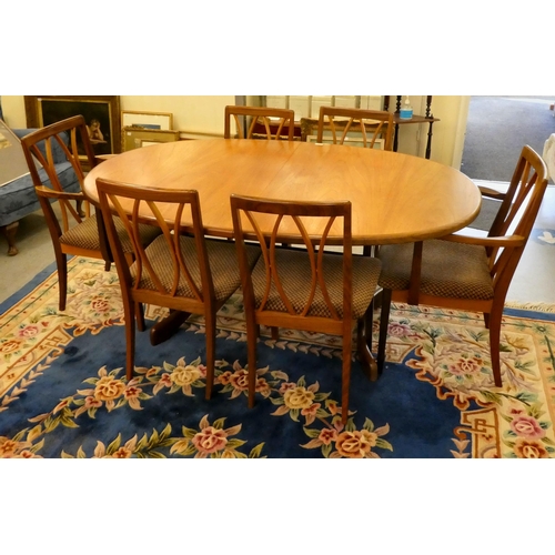 193 - A G-Plan teak dining table, the ovoid shaped extending top, concealing a foldover internal leaf  30