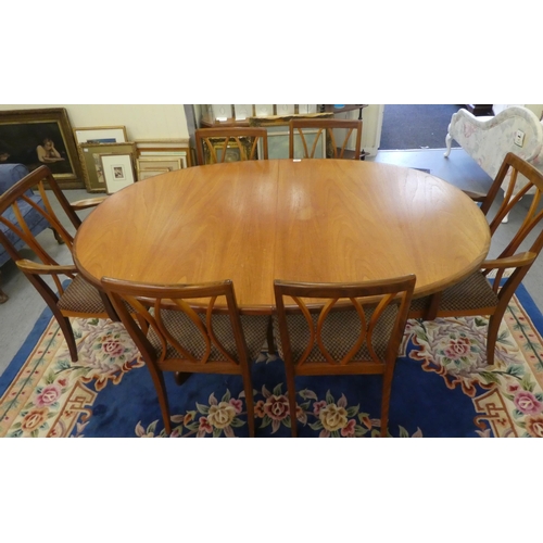 193 - A G-Plan teak dining table, the ovoid shaped extending top, concealing a foldover internal leaf  30