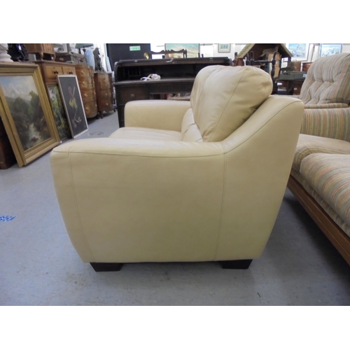 201 - A modern cream hide upholstered two person settee