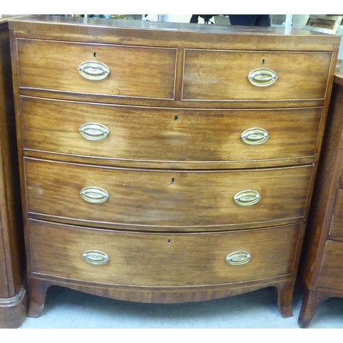 203 - An early 19thC mahogany bow front dressing chest with two short/three long drawers, raised on bracke... 