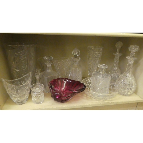 215 - Decorative and functional glassware: to include decanters; and vases  largest 13.5